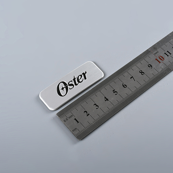 Gegraveerde metalen logolabels