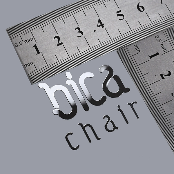 Nikkellogosticker voor machine