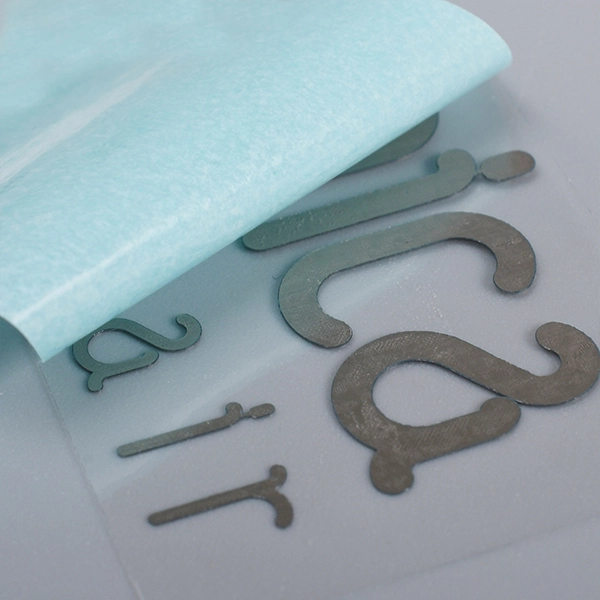 Nikkellogosticker voor machine