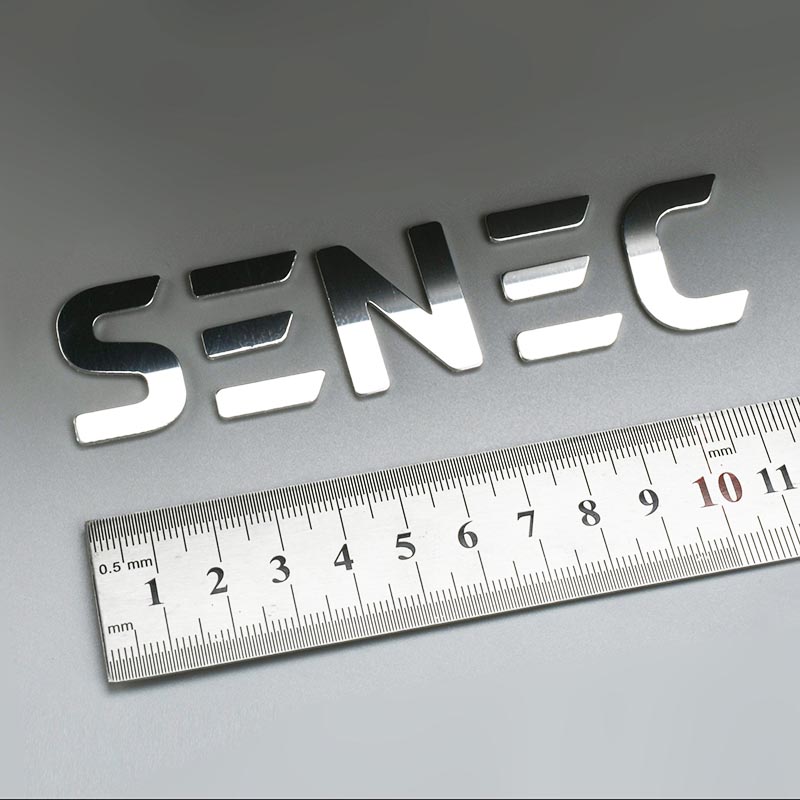 Logo gegraveerd metaal