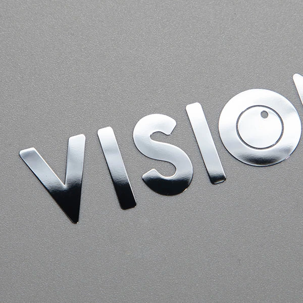 Overdracht metalen logosticker
